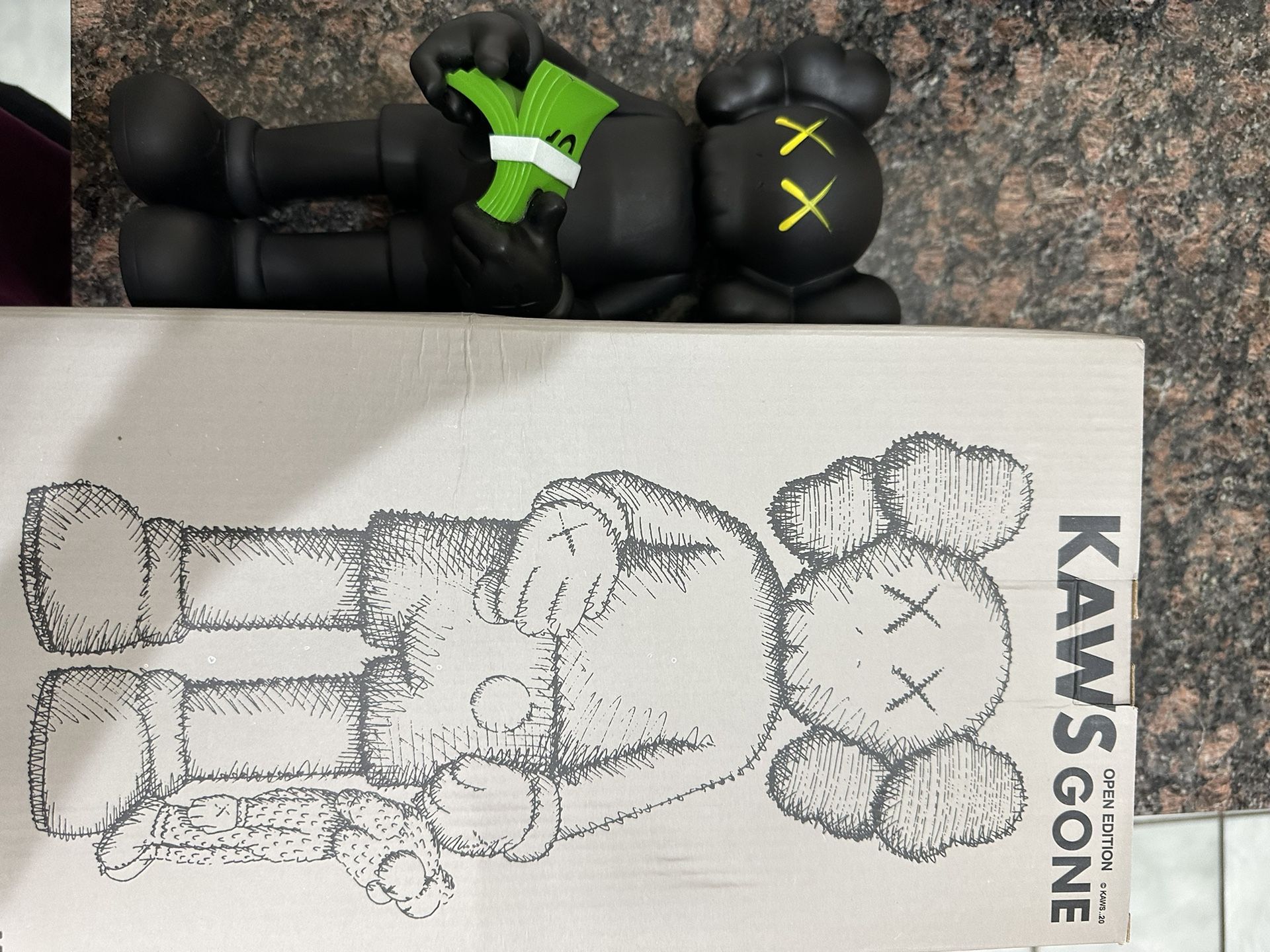 Kaws Gone Money stack Figure