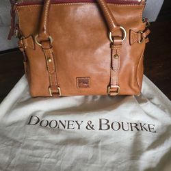Dooney and Bourke fringed hand bag.