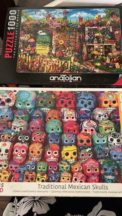 1000 piece puzzles (one is brand new