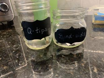 Two Mason Jars With Chalk Labels 