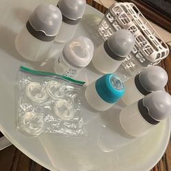Seis. Biberones Nano bebé, cuatro tetilla y un accesorio Para Lavar Los Accesorios Pequeños En La Lavadora De Platos