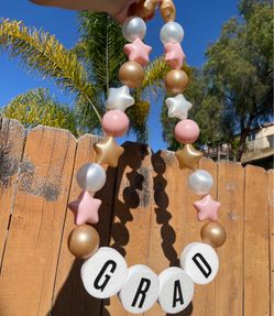 Friendship bracelet grad lei