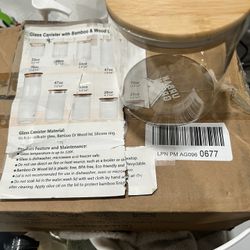 23 oz Clear glass canister with a bamboo lid. Perfect for storage.  Box of 6