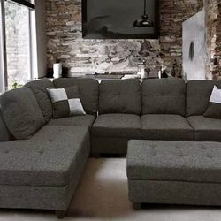 Charcoal linen sectional couch and ottoman