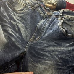 5 Pairs Of Men’s Pants Size- 34/30. 2 Large Men’s Jersey Type Shirts