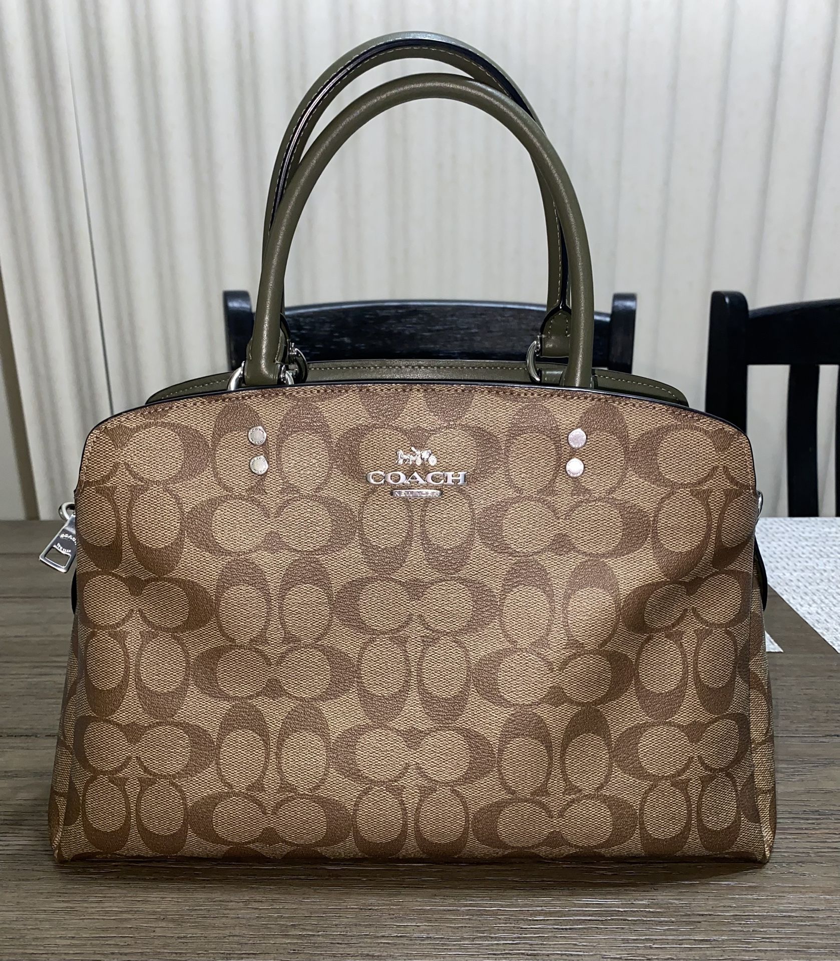 Coach Pouch LOCATED IN COVINA