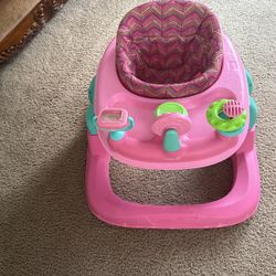 A Pink Baby Walker