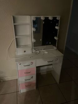 white and pink hello kitty desk with mirror and lights