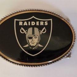 Raiders Football Belt Buckle Lights up but needs battery Dont Know If It Works Small scratch .  Raiders Chain Necklace $60
