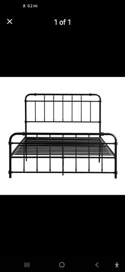 Black bed frame with mattress