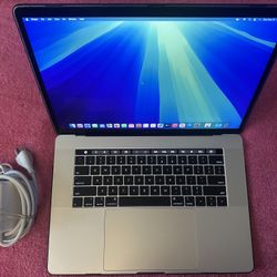 2018 MacBook Pro 15 inch Retina, 2.2 GHz i7, 16 GB RAM, 500 GB SSD.