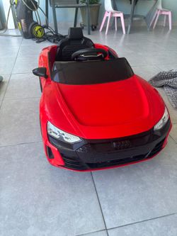 Red sport car for kids like new audi convertible