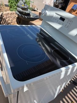 Stove in excellent condition and dishwasher—everything works well. $250 x2