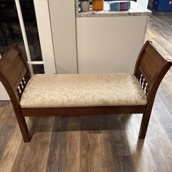 MCM style American scroll arm upholstered bench w/ beige Damask floral upholstering.  Wood & cane   Also lots of storage under the bench 