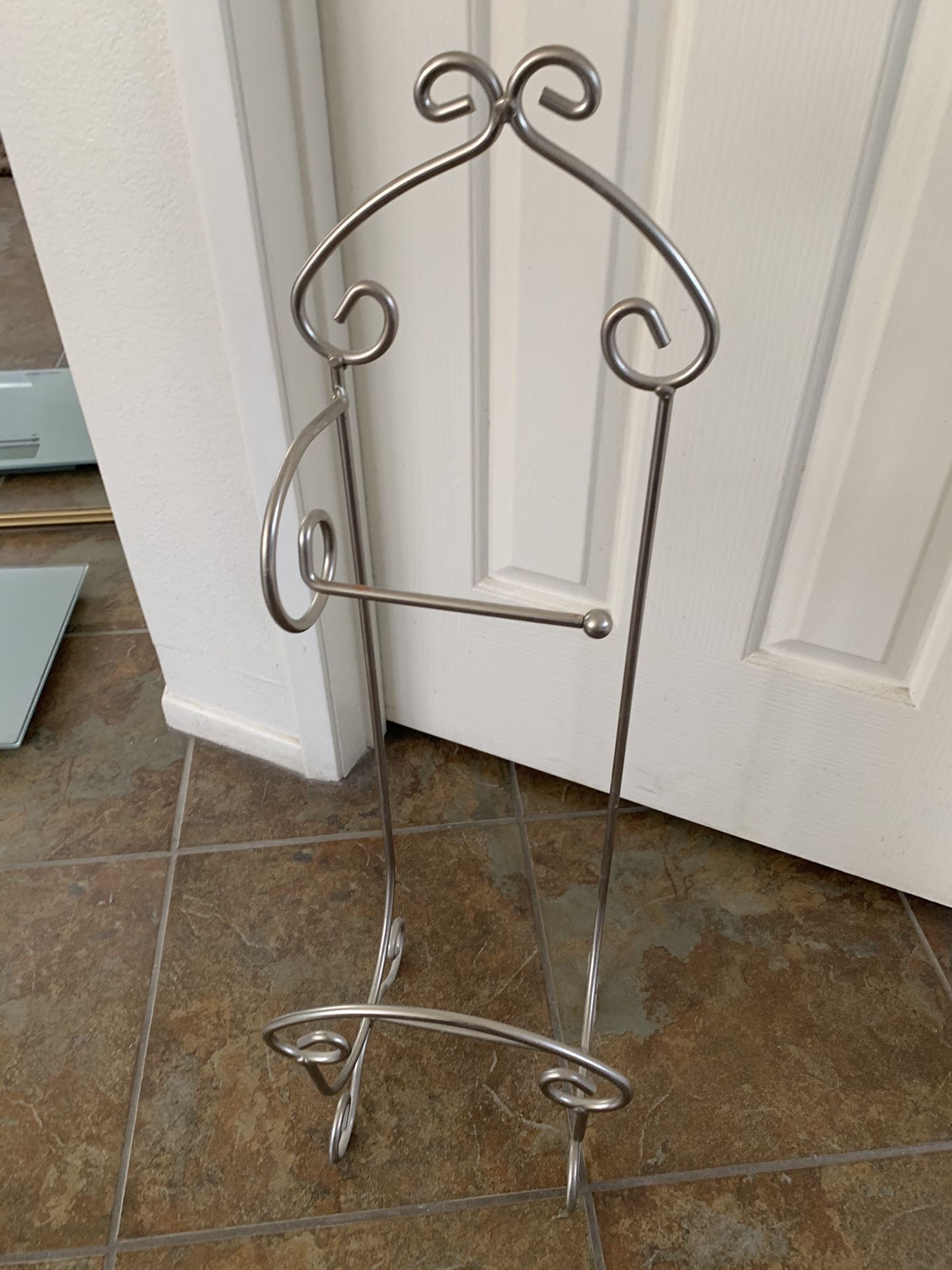 Toilet paper holder with magazine rack.