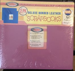 NEW Scrapbooks in original packaging never used. Good quality they are both pink bonded leather and have 30 pages each.
