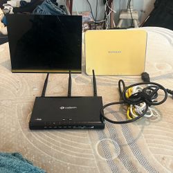 Netgear Wifi Routers And Modem With Chords