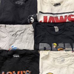 6 brand new  Lot of 6 men’s 2XL  tshirts  Including Michael Myers Halloween 2 Jaws Naruto  Levi’s  Mickey nerf And Ghostbusters  All never worn brand 
