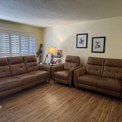 Abbyson Leather reclining couch set 