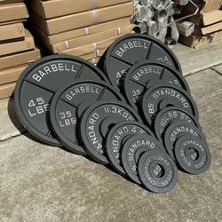 Brand New Cast Iron Olympic Plates 