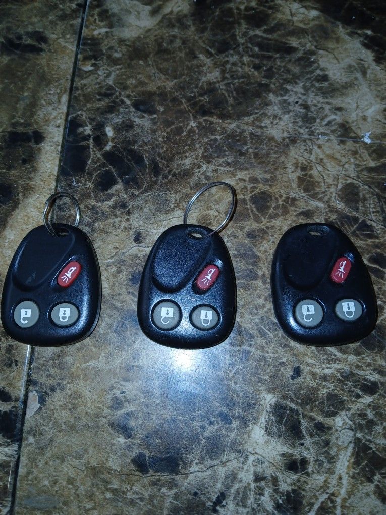 GENUINE GM CHEVY KEYLESS ENTRY REMOTE FOB Lot Of 3 (2 are new never used)
This is a lot of 3 genuine GM Chevy keyless entry remote fobs. The fobs ar