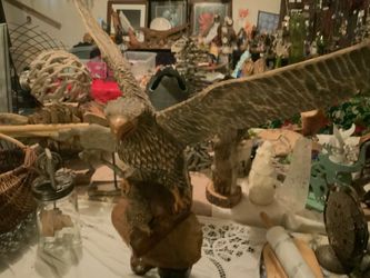 Wood eagel and chick sculpture