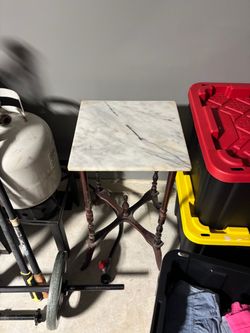 Wood frame marble top table