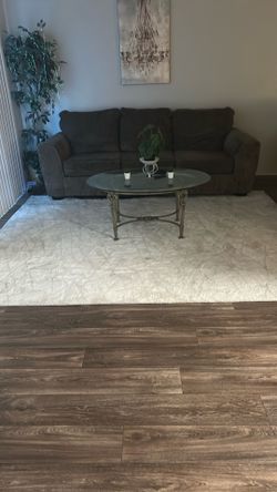 Carpet and glass table