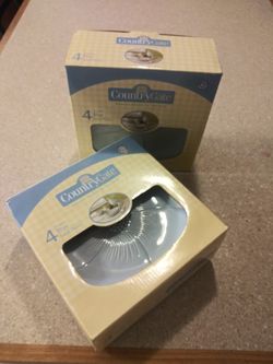 2 sets of 4 plates each. All brand new. Never opened.