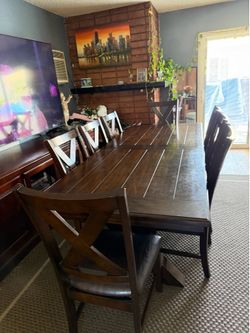 Dinning table with 8 chairs. Real wood