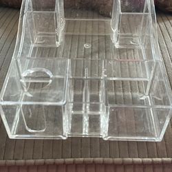 Clear plastic makeup container.