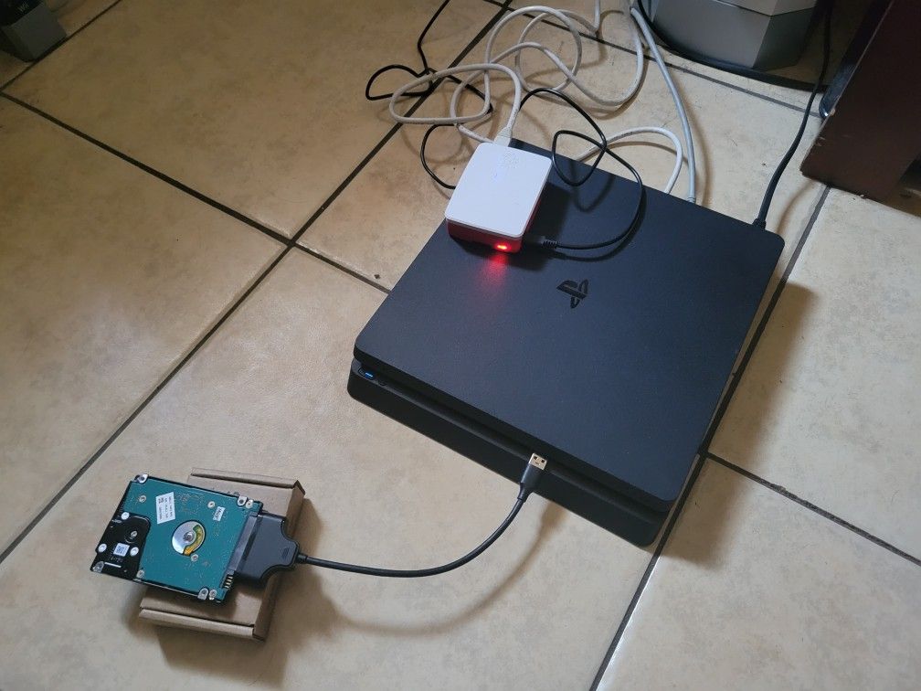 Goldhen PS4 Slim 1TB Hdd 11.00 Comes With 40+ Games