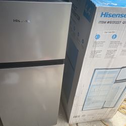 New  4.4 cu. Ft compact Refrigerator $120  still have box