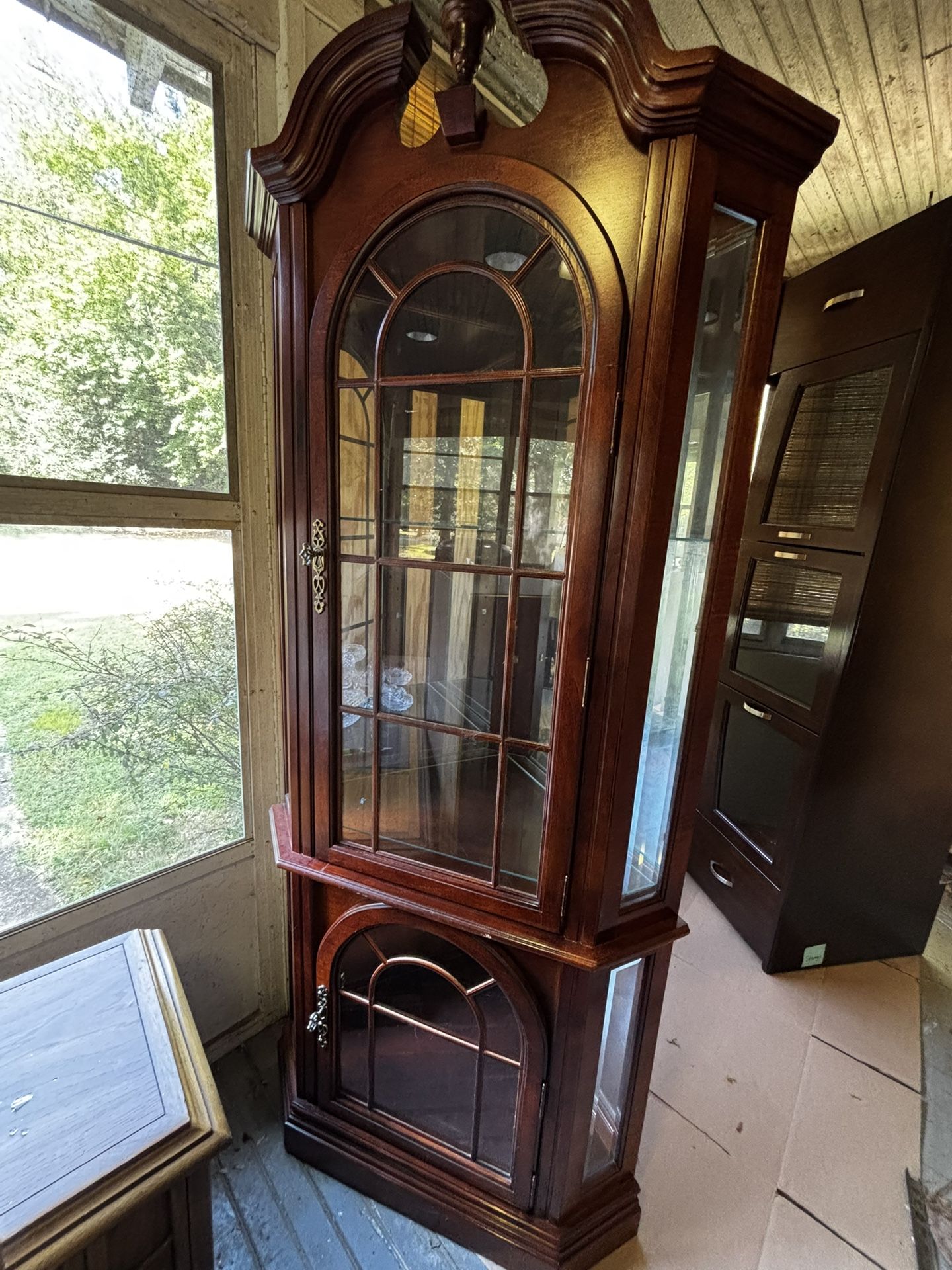 Antique corner curio cabinet