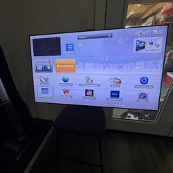 Samsung Smart TV displaying its Smart Hub interface.  
