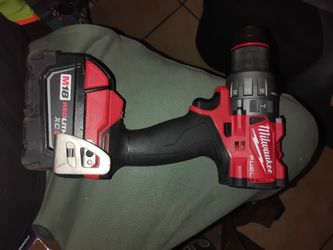 Milwaukee hammer drill + battery
