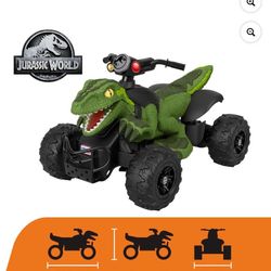 Battery-powered ride-on ATV with cool Jurassic World Raptor dinosaur styling