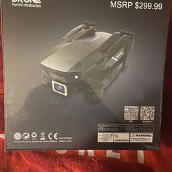 Brand new inbox.  The image shows a Yomi LF620 drone in its original packaging. The packaging indicates that it's a 4K HD camera drone with obstacle a