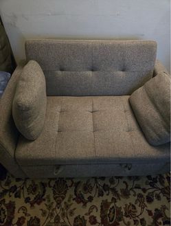 Compact grey upholstered loveseat (pick-up only)