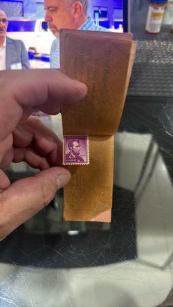 Rare unused Purple Lincoln stamp.