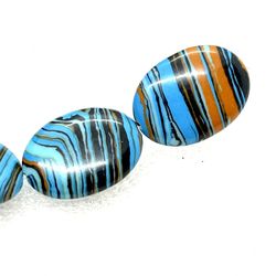 Strand Of Synthetic Oval Beads