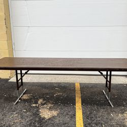 8’ Folding Table with Adjustable Height. Adjusting Height 96” Folding Table. Needs WD40, stiff legs 