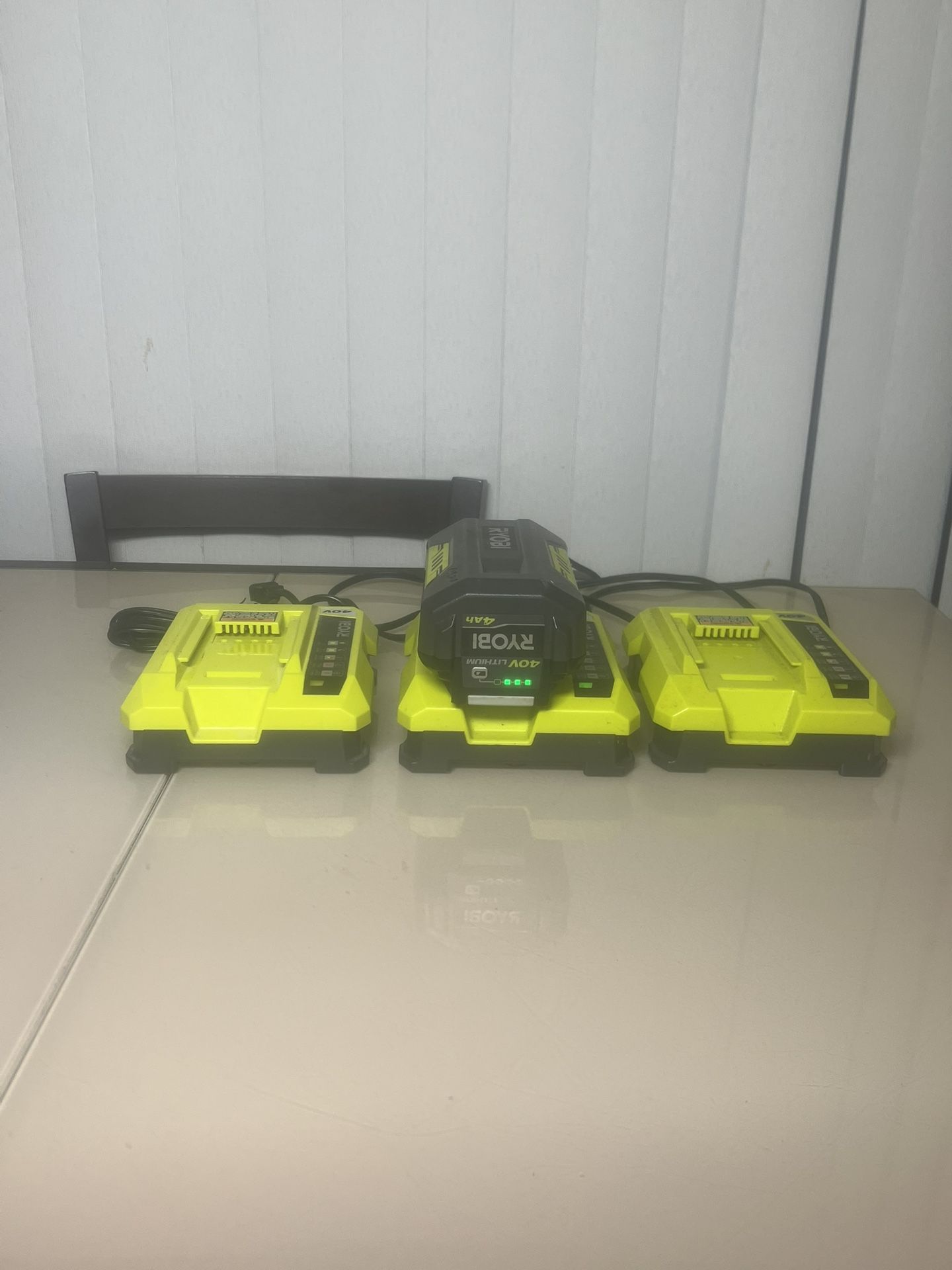 RYOBI 40V 4Ah Lithium OP40401 Battery & LOT OF 3 RYOBI OP401 Charger ALL WORKS. Used in good condition with some minor cosmetic blemishes. These blemi