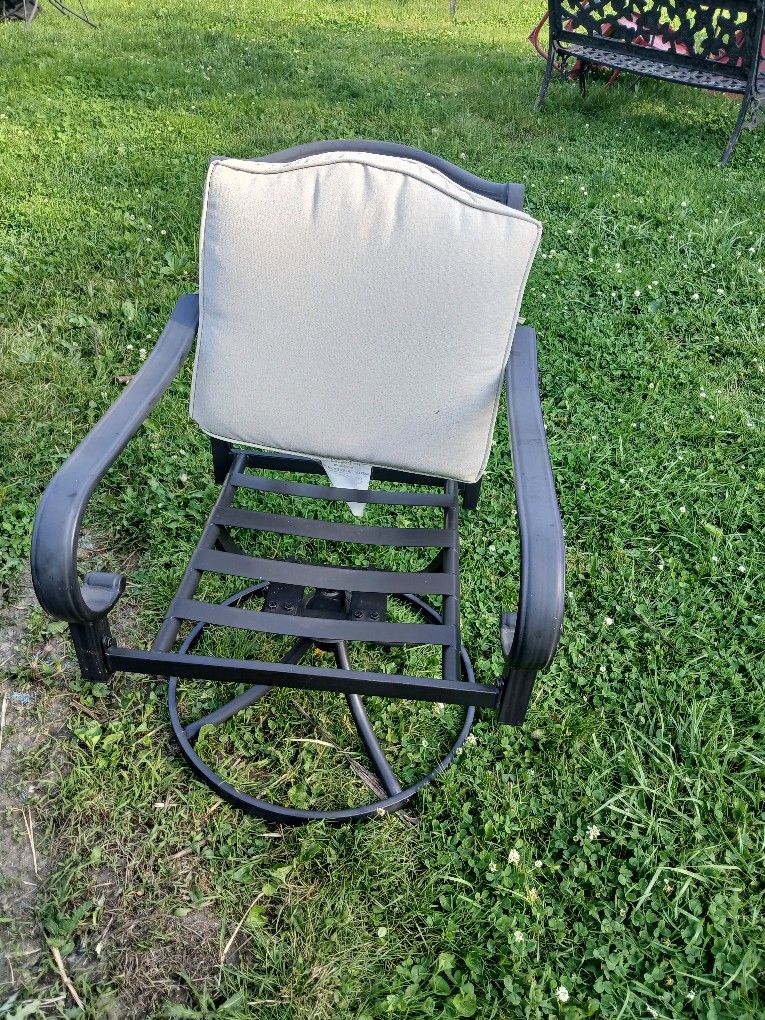 Two Hampton Bay Outside Swivel Chairs