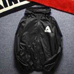 Black windbreaker