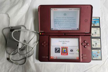Nintendo DSi XL Bundle with Charger and 5 Games