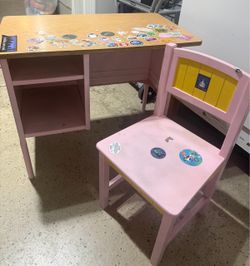 Metal desk with wooden top.  Wooden chair.  Well loved.  30 L x 18w x 25 H.  Cash only.    No electronic payments or trades.    No delivery.   Porch p