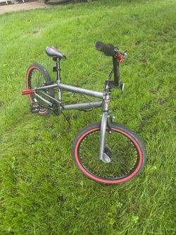 Boys bike with pegs