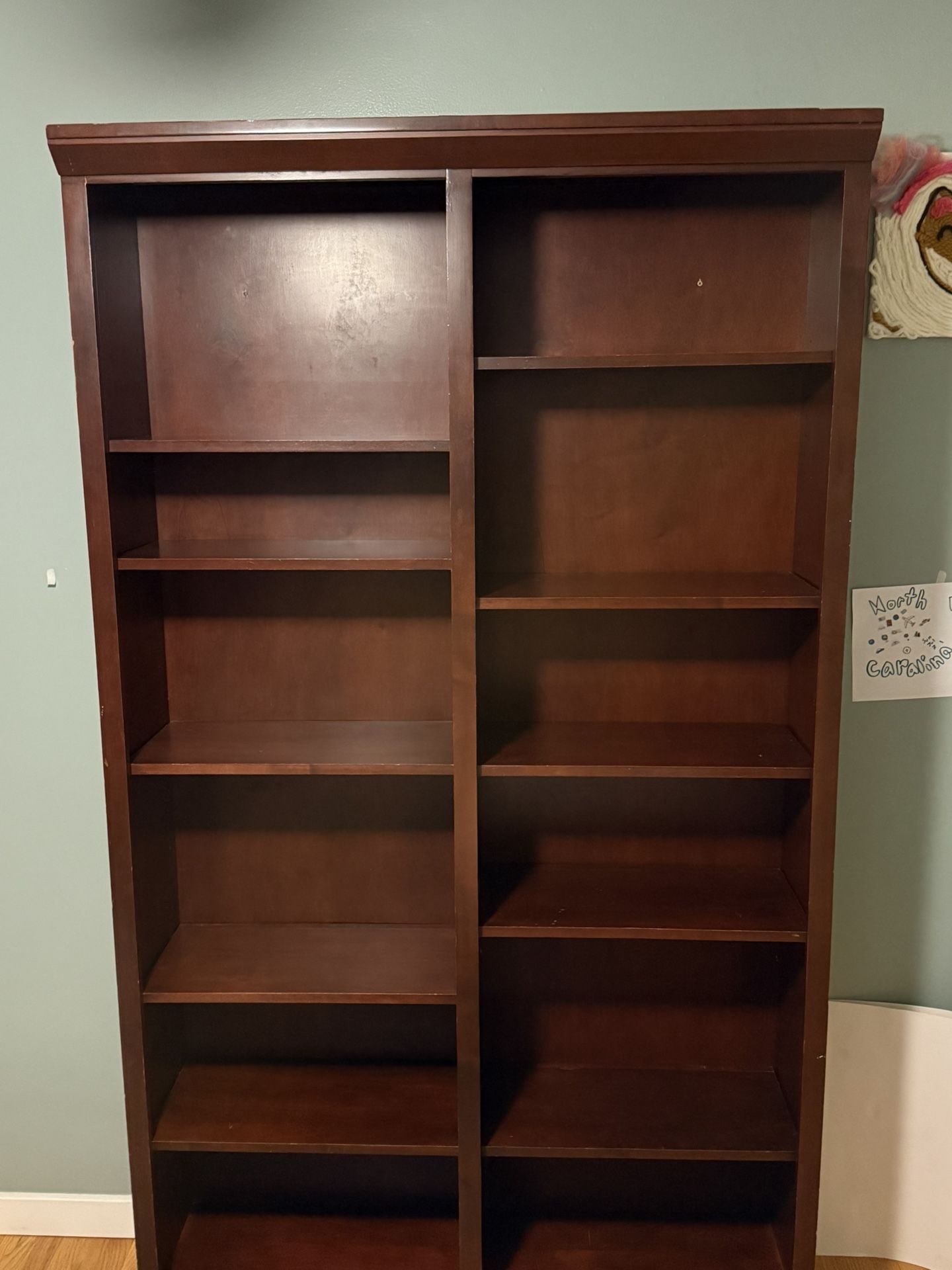 Wooden bookshelf with adjustable shelves