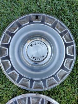 Vintage Ford Mustang hubcaps
